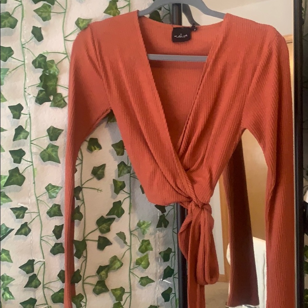 Orange-red tie up shirt